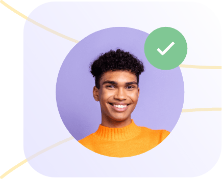 A person with curly hair smiles, wearing an orange sweater, set against a purple background. The image features a green circle with a white checkmark in the top right corner, reminiscent of acing the Wonderlic Test, all within a rounded rectangle with light purple background and lines.