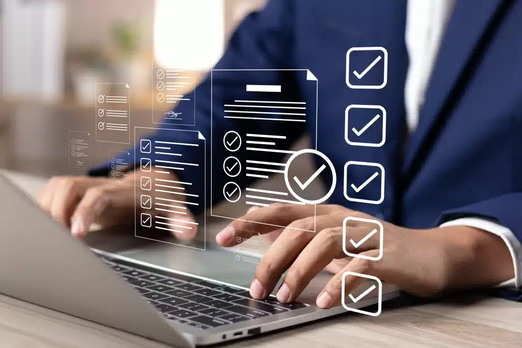 Candidate Screening Tools and evaluation software, application process, Business man using laptop and tablet online checklist survey, Filling out digital checklist, Questionnaire with checkboxes.